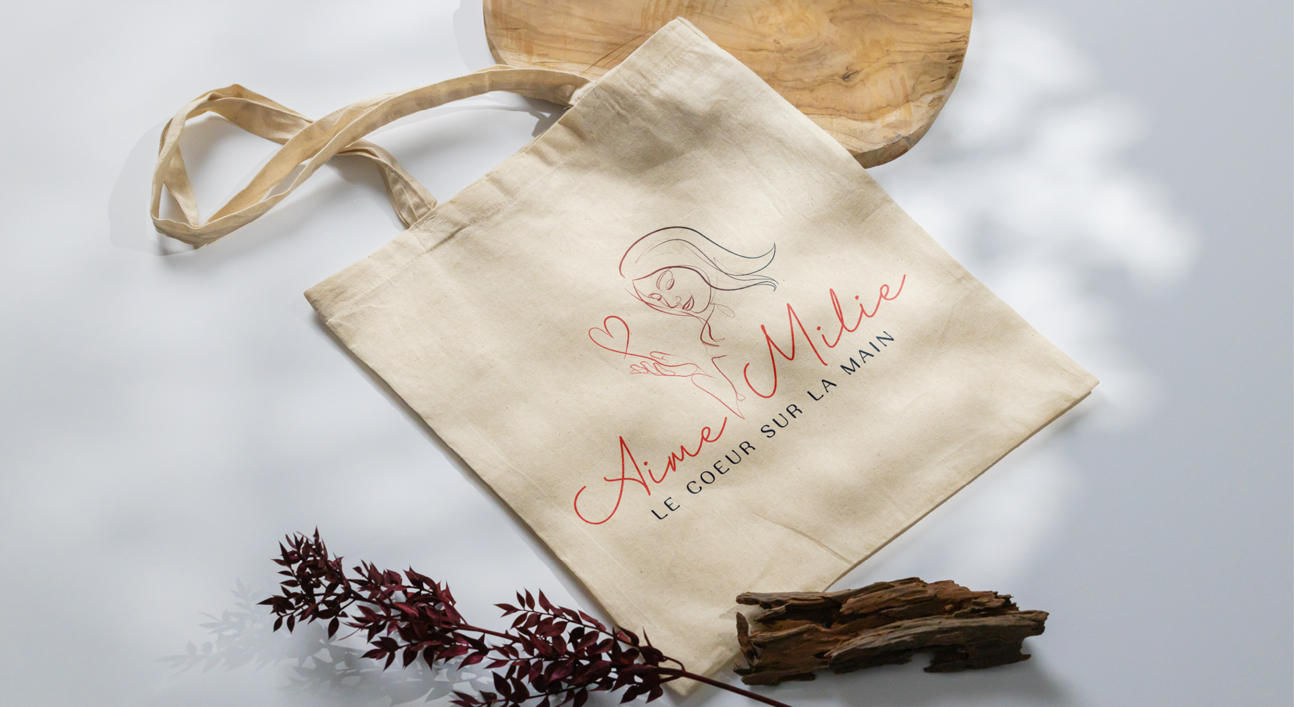 Maquette du logo Aime-Milie par Mathilde Vassallo pour Carton Graphique.