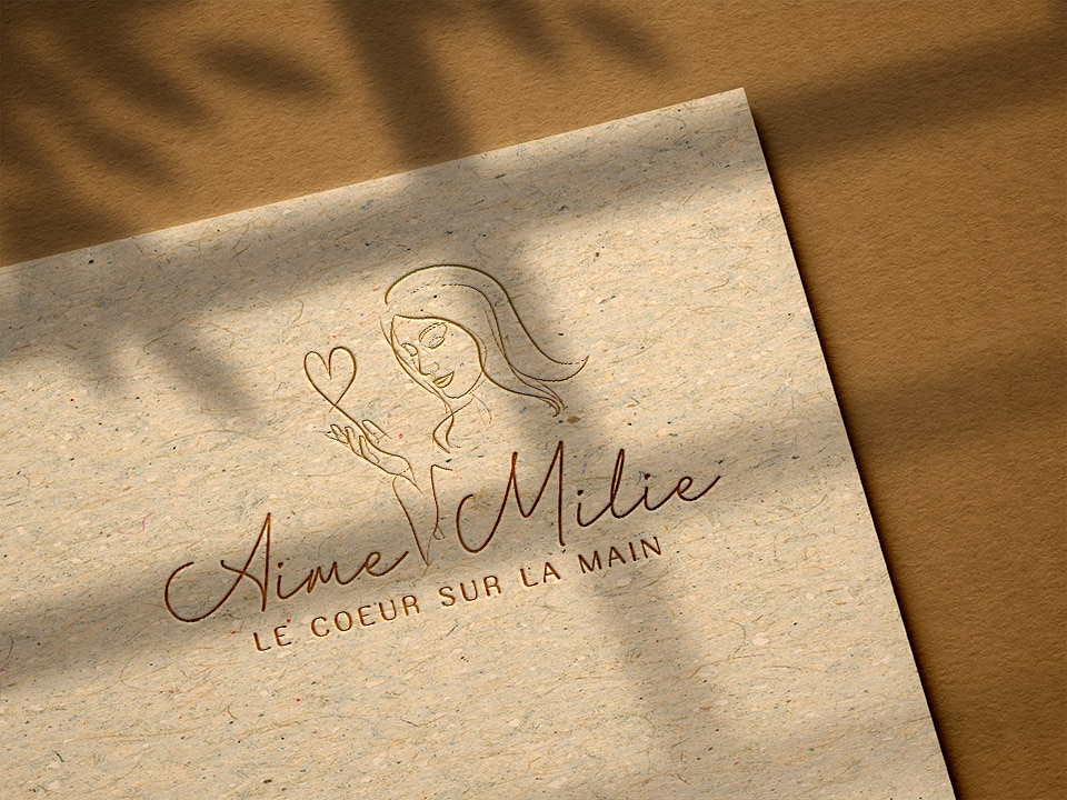 Maquette du logo Aime-Milie par Mathilde Vassallo pour Carton Graphique.
